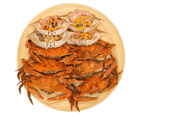 .Fresh steamed crab select crab claw on a plate with seafood sauce ready to serve in white background.
