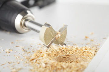 Forstner cutter for cutting holes in wood, work on the additive of furniture fittings