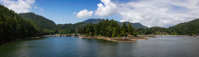 Fototapeta na wymiar Beautiful Panoramic View of Snug Cove in Bowen Island during a sunny and cloudy day. Located in Howe Sound, near Vancouver, British Columbia, Canada.