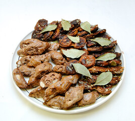 mmaritate is a typical dish of the southern Italy region of Puglia with marinated figs and fig biscuits called 'mmaritate isolated on white