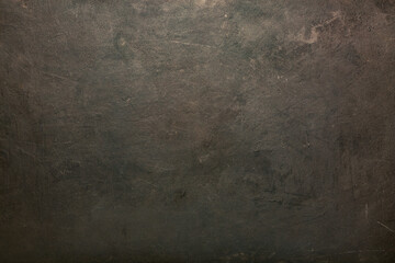 dark wall background. Empty workplace, in front of an abstract package. copy space