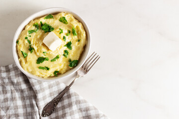 Homemade Mashed Potatoes, boiled puree, on white background, copy space