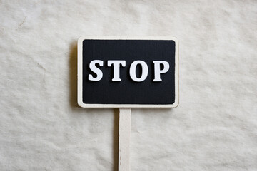 Stop sign on the paper background