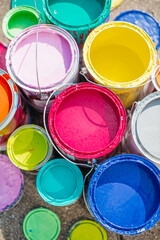 Cans of colorful paint © Leslie Rodriguez