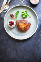 duck confit leg baked poultry meat Menu concept serving size. food background top view copy space for text organic healthy eating keto or paleo diet