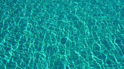 glare of pool water as background texture