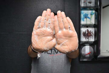 FRONT PHOTO OF LIQUID SOAP APPLIED ON BOTH THE HAND PALMS