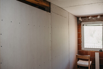 Renovation of an old house with plaster board and insulation material