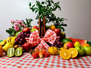 Delicious and healthy fruits, rich in vitamins and minerals, displayed in a beautiful picnic basket.