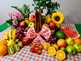Delicious and healthy fruits, rich in vitamins and minerals, displayed in a beautiful picnic basket.