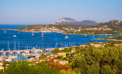 Portisco, Sardinia, Italy - Panoramic view of yacht marina and port of Portisco resort town - Marina di Portisco - at Costa Smeralda Emerald Cost of Tyrrhenian Sea - obrazy, fototapety, plakaty