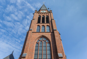 Fototapeta na wymiar Tower of the historic church of Nijverdal, Netherlands