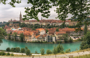 Fototapeta na wymiar View from above on the historic architecture of Bern and the river Aare - Switzerland