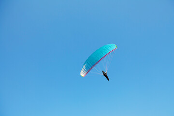Glider pilot flying on glider. Skydiving flying. Parachute extreme sport.