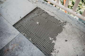 Ceramic tiles and tools for tiler ceramic tiles installation Home improvement, renovation ceramic tile adhesive, mortar, level