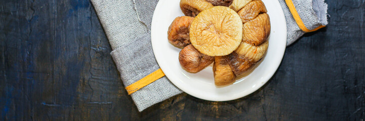 dried figs fruits natural sweet dessert Menu concept serving size. food background top view copy space for text keto or paleo diet organic 