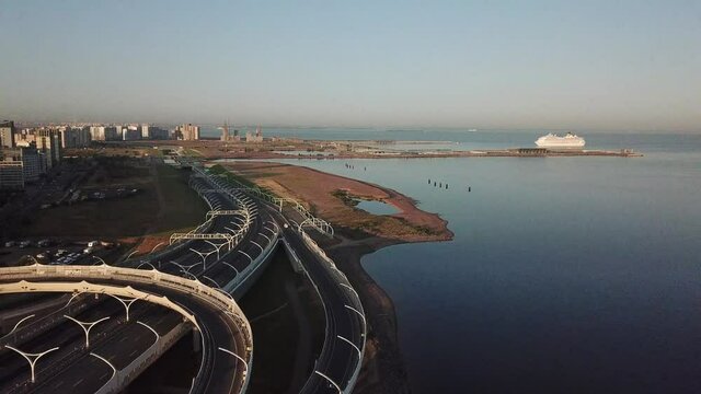 4K aerial early morning sunrise drone video of beautiful Gulf of Finland bay view of ZSD highway cable-stayed bridges in Saint-Petersburg, Russia's northern capital
