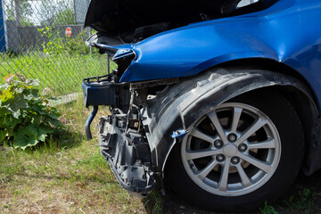 Damaged blue car