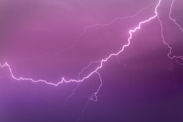 Flash of lightning in the night sky