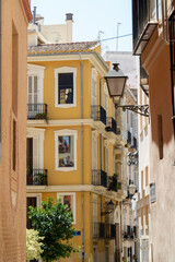 Fototapeta na wymiar View of the house in old street of Valencia