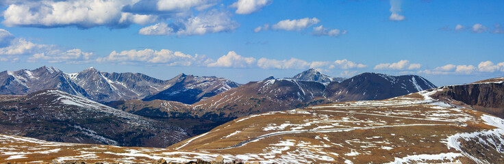 Highest paved route in USA "Trail Ridge Road" winding through Rocky Mountain National Park with hairpin bends and snowy peaks. Colorado, United States of America
