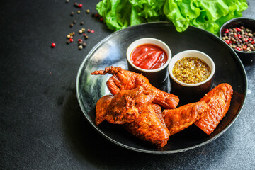 smoked chicken wings
meat poultry barbecue grill
Menu concept serving size. food background top view copy space