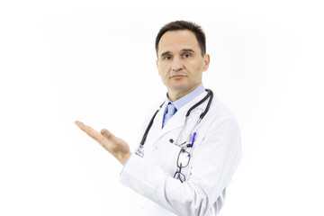 Fototapeta premium Serious attractive male doctor in medical coat and stethoscope pointing at empty text space isolated on white background. Health, healthcare, insurance and medicine clinic ads concept