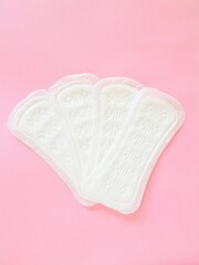 Intimate hygiene women's accessories. Daily sanitary pads. Menstrual cycle.