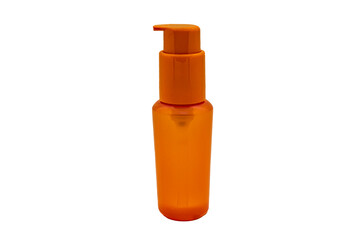 Plastic orange bottle for cosmetics isolate close-up