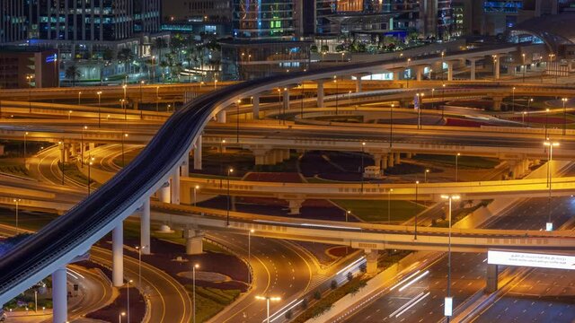 dubai city night illuminated traffic street road junction rooftop timelapse panorama 4k united arab emirates  