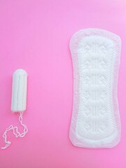 Intimate feminine hygiene products. The daily tampon and sanitary pads. Menstrual cycle.