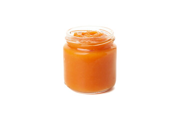 Glass jar with healthy baby food isolated on white background