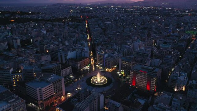 Athens, Greece - 7 June 2020: Night cityscape of Athens 4k, Omonia Square at night time