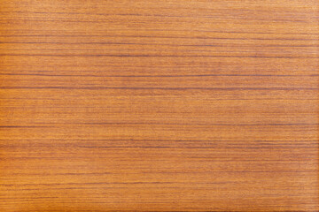 Teak timber texture. Sanded smooth surface. Bright orange background.