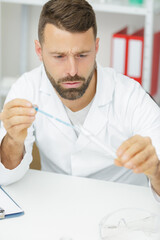 Fototapeta premium scientist is doing chemical lab research