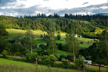 Fototapeta premium Views of the Carpathians - this is a beautiful country in the mountains of the Carpathians after sunset. Carpathians are located in Ukraine. In the Carpathians, beautiful nature.