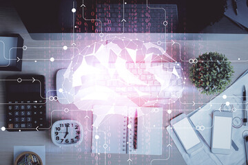 Multi exposure of brain sketch hologram over topview work table background with computer. Concept...