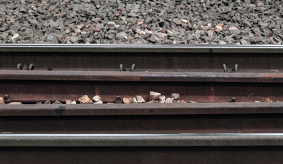 Fototapeta premium A closeup of rusty railroad tracks