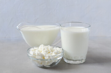 Homemade fermented beverage in a glass - kefir, cottage cheese, on a white background. Sour milk drink, yeast for yeast bacterial fermentation, intestinal health concept. Fashionable food and drinks