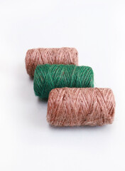 Tree coil of jute rope for packing on a white background.