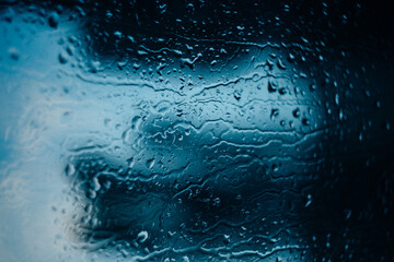 Obraz premium water drops on glass, window glass with condensation