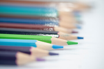 A group of pencils of assorted colours