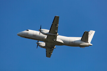 propeller airplane in blue sky