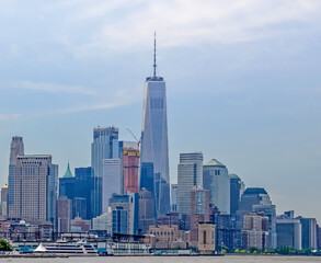 Lower Manhattan skyline viewed from sea side in New York City, USA.