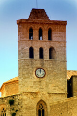 Fototapeta na wymiar Eivissa cathedral clock tower in Ibiza, Spain.