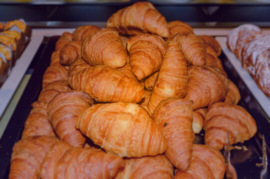 Freshly baked french croissants ready for serving.