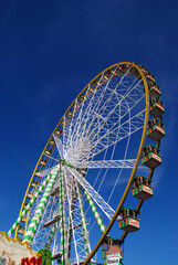 traditional Ferris wheel at amusement park
