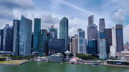 Fototapeta na wymiar SINGAPORE - JANUARY 2, 2020: Aerial view of Marina bay area with skyscrapers