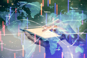 Double exposure of business theme sketch hologram and woman holding and using a mobile device.