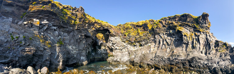 Panoramic view of Arnarstapi coastline, Iceland. Snaefellsnes rocks in summer season